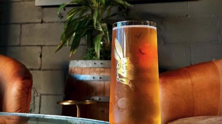 Reve Brewing beer served inside a Jacksonville taproom.